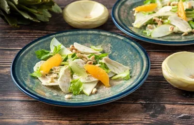 Salade tiède d'artichauts à l'orange et jambon de parme
